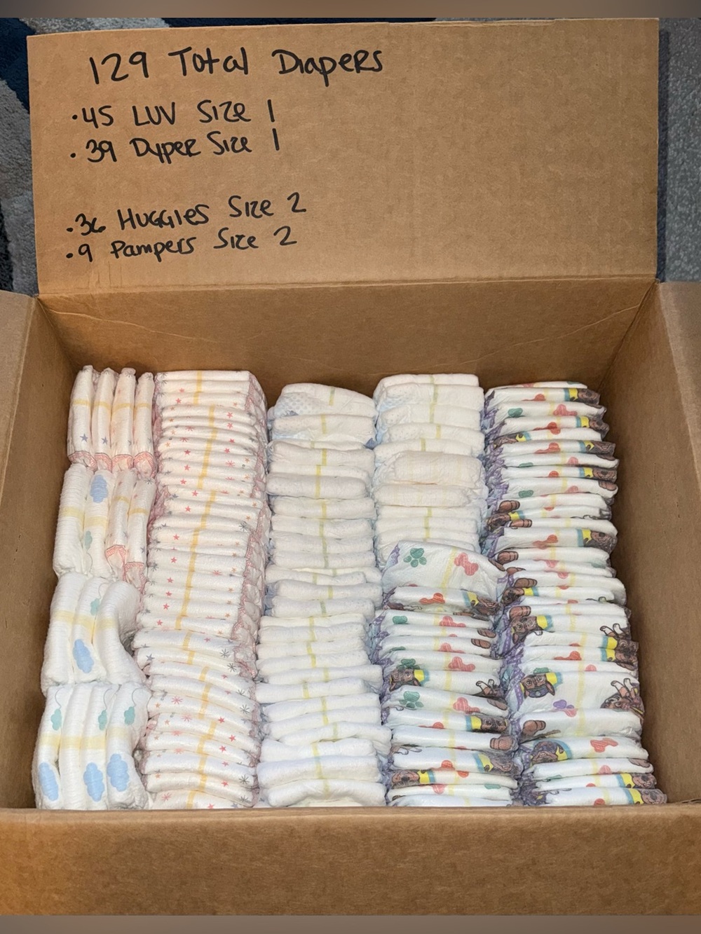 Box Of 129 Assorted Baby Diapers Size 1 & 2